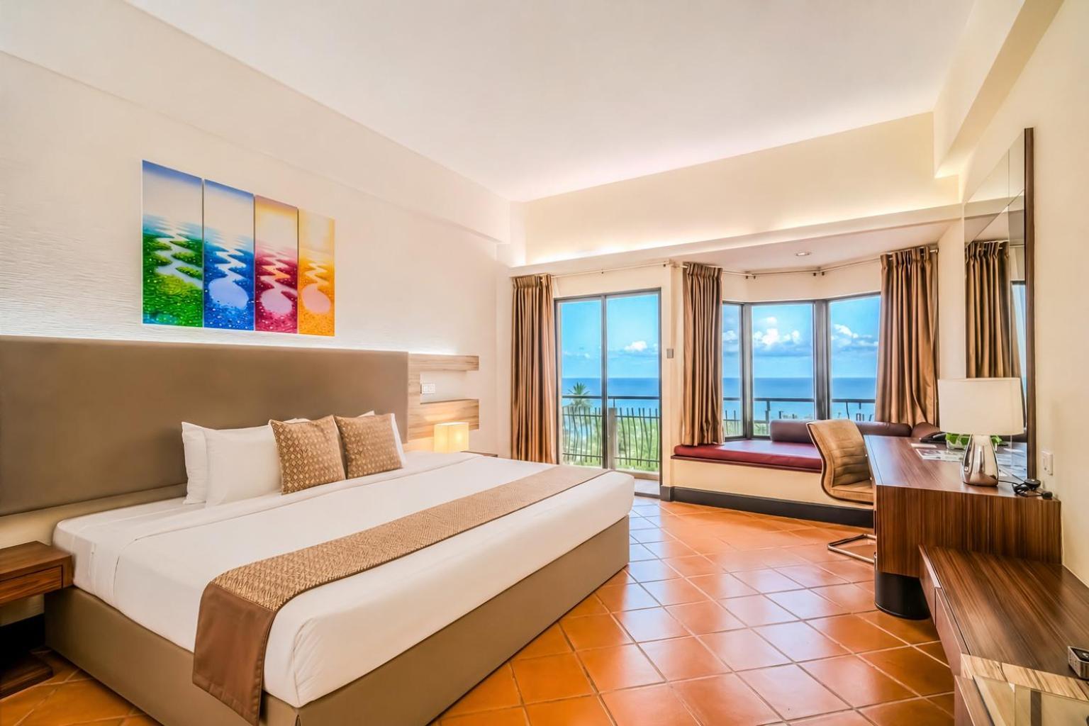Chambre Lit King-Size Deluxe - Côté Mer
